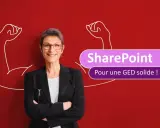 Une femme souriante, symbolisant la force, se tient devant un fond rouge. Le texte "SharePoint Pour une GED solide !" est affiché, suggérant une solution robuste pour la gestion électronique des documents.