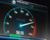 Test de débit internet : l'aiguille indique 58.55 Mbps, une mesure de la vitesse de téléchargement.