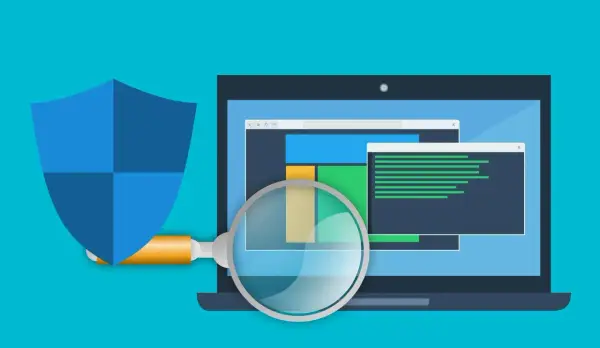 Bouclier bleu protégeant un ordinateur portable analysé par une loupe. Illustration sur la façon de se débarrasser du ransomware.